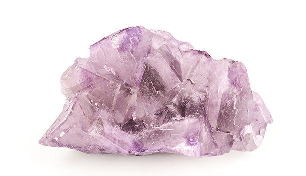 Close up view of a light purple flourite crystal cluster.
