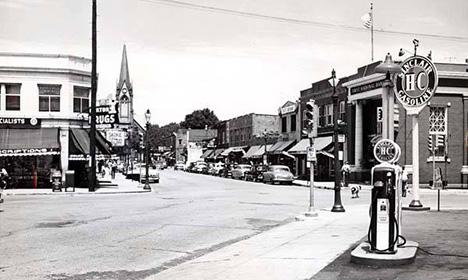black and white photo of a street intersection