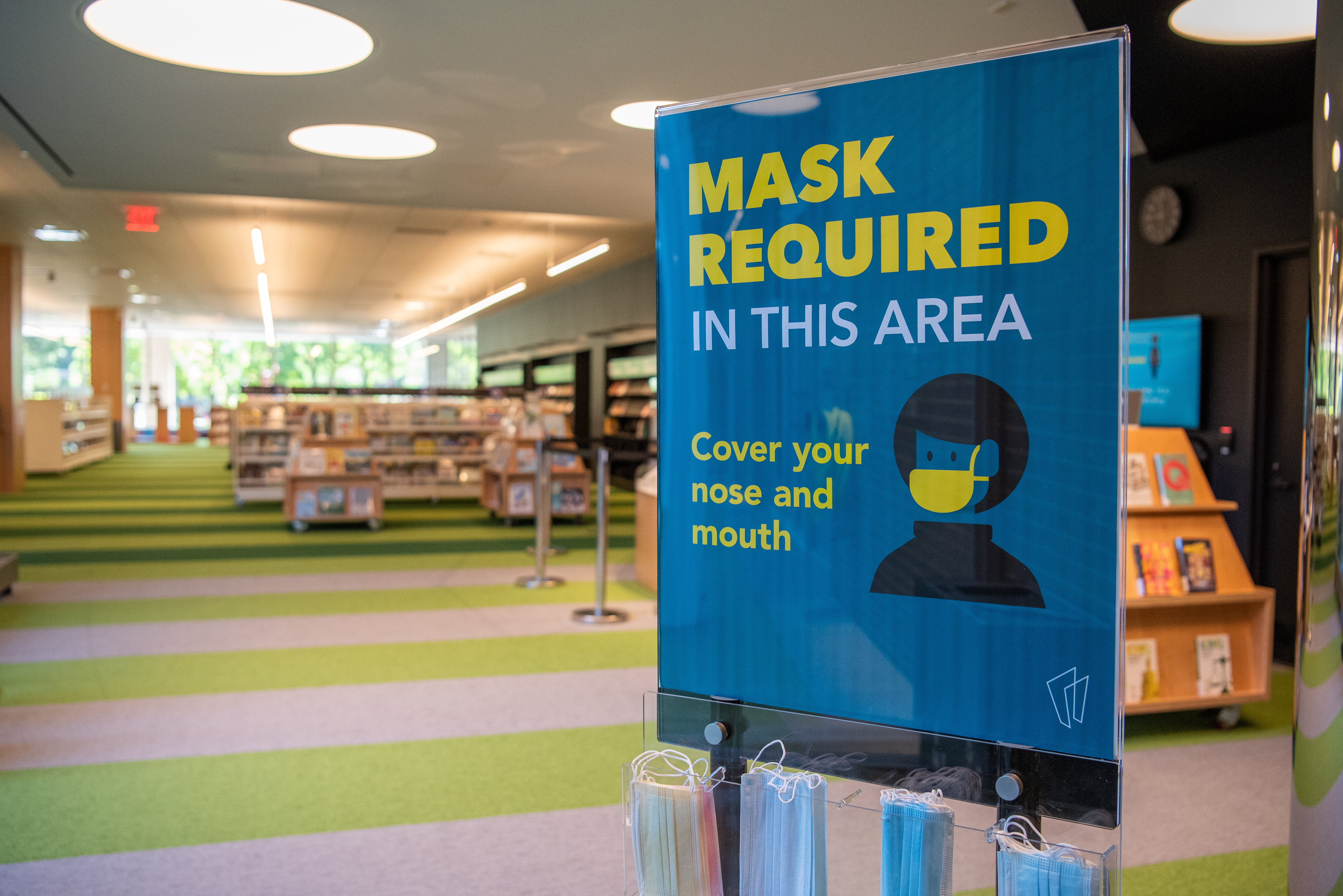 A photo of a poster at the entrance to the Kids area which states that masks are required A photo of a poster at the entrance to the Kids area which states that masks are required