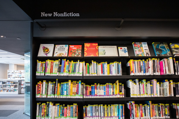 A view of the colorful New Nonfiction shelves on the second floor of the Skokie Public Library.